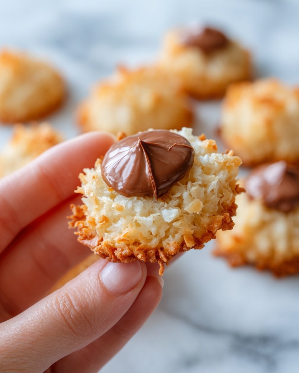 Coconut Macaroon Blossoms Recipe - Recipe Image — Coconut Macaroon Blossoms, coconut cookie recipes, chocolate kiss cookies, tropical cookie treats, easy holiday cookies